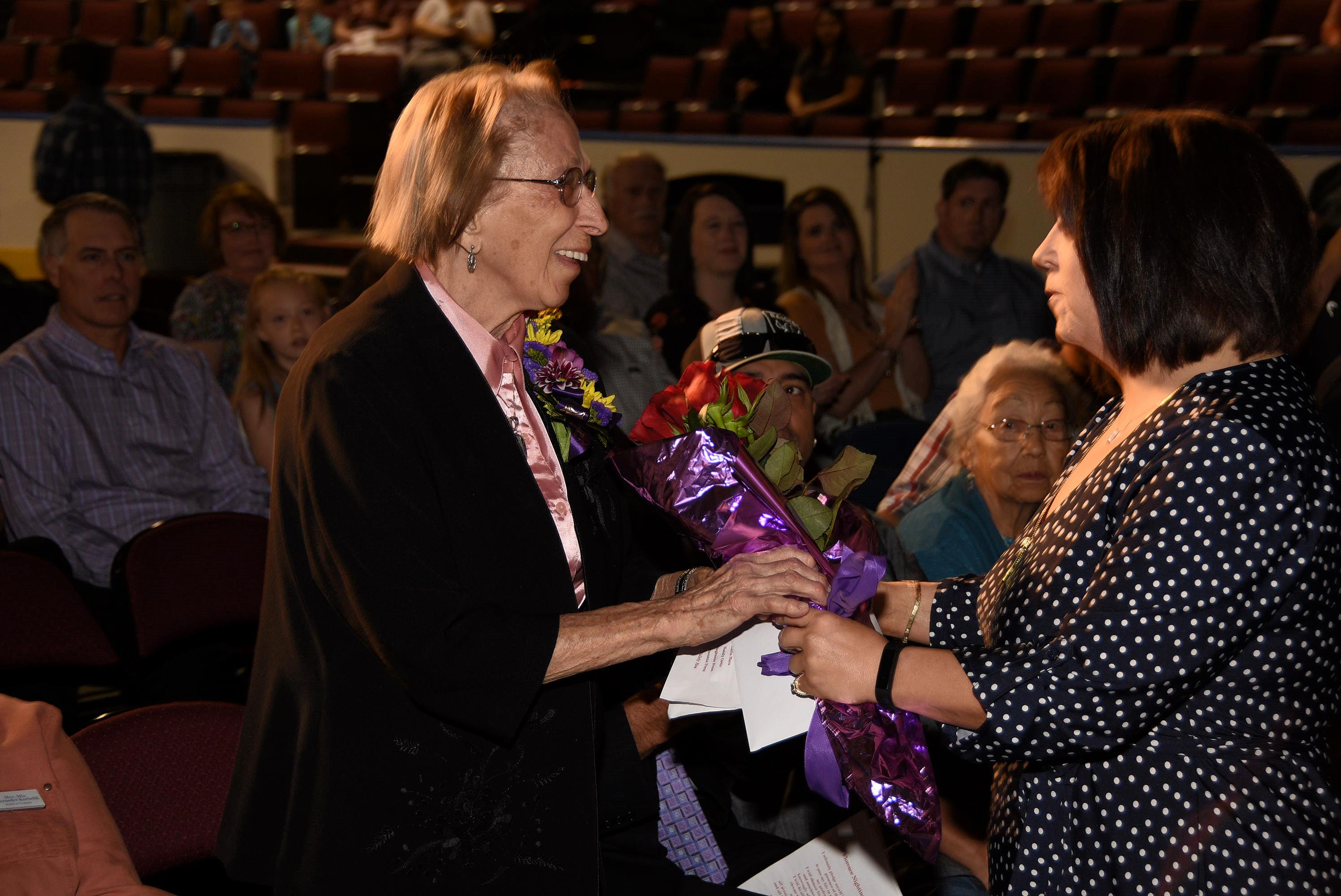 Floris Jean honored with flowers during the 2018 Nursing Pinning
