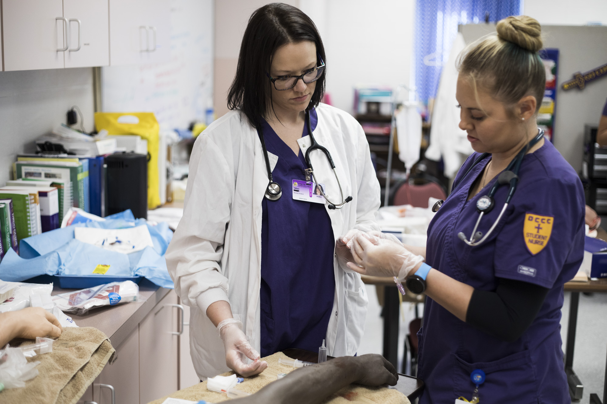 DC3 Nursing students in the lab preparing an IV