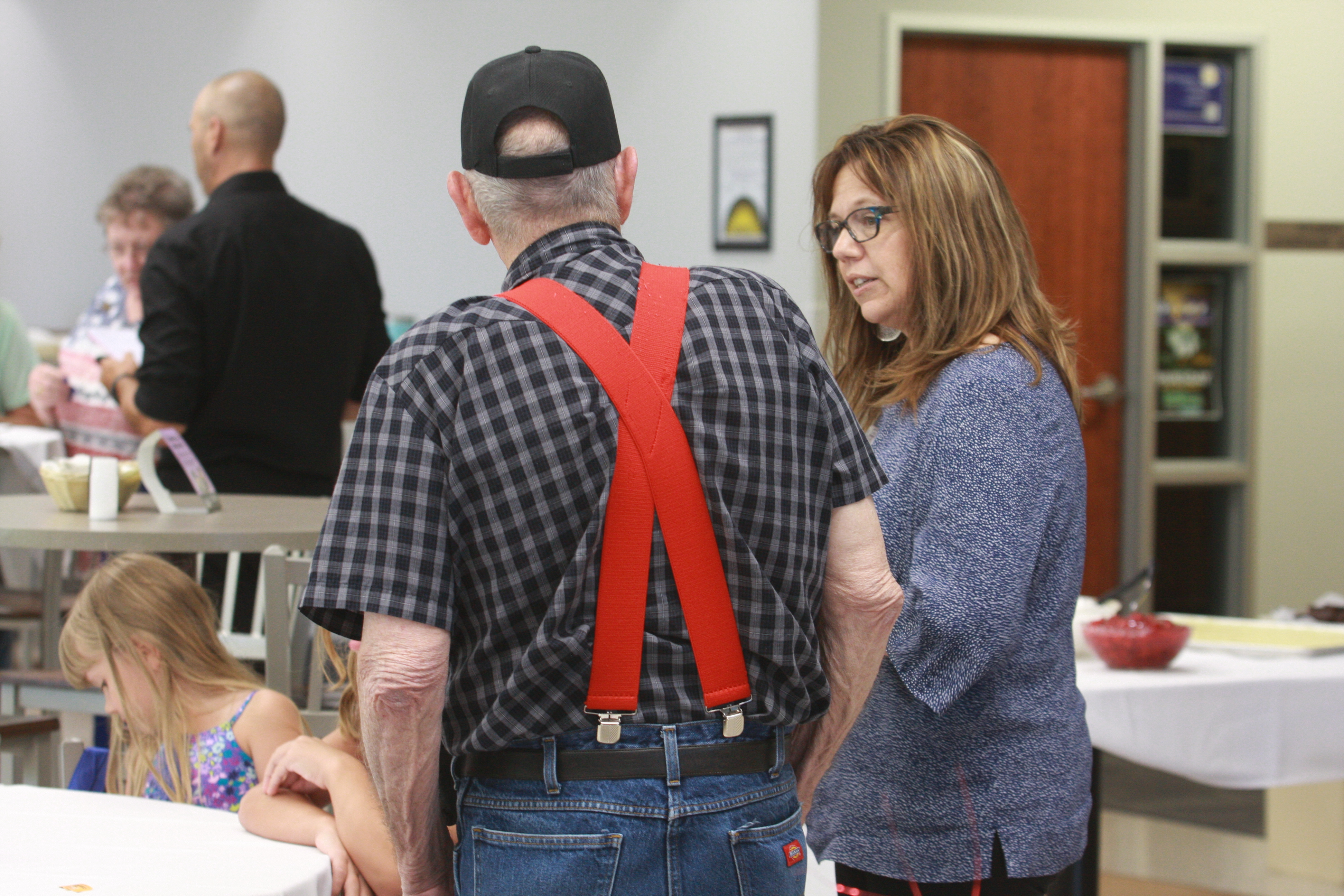 RSVP Director Lisa Killion speaks with an RSVP participant.