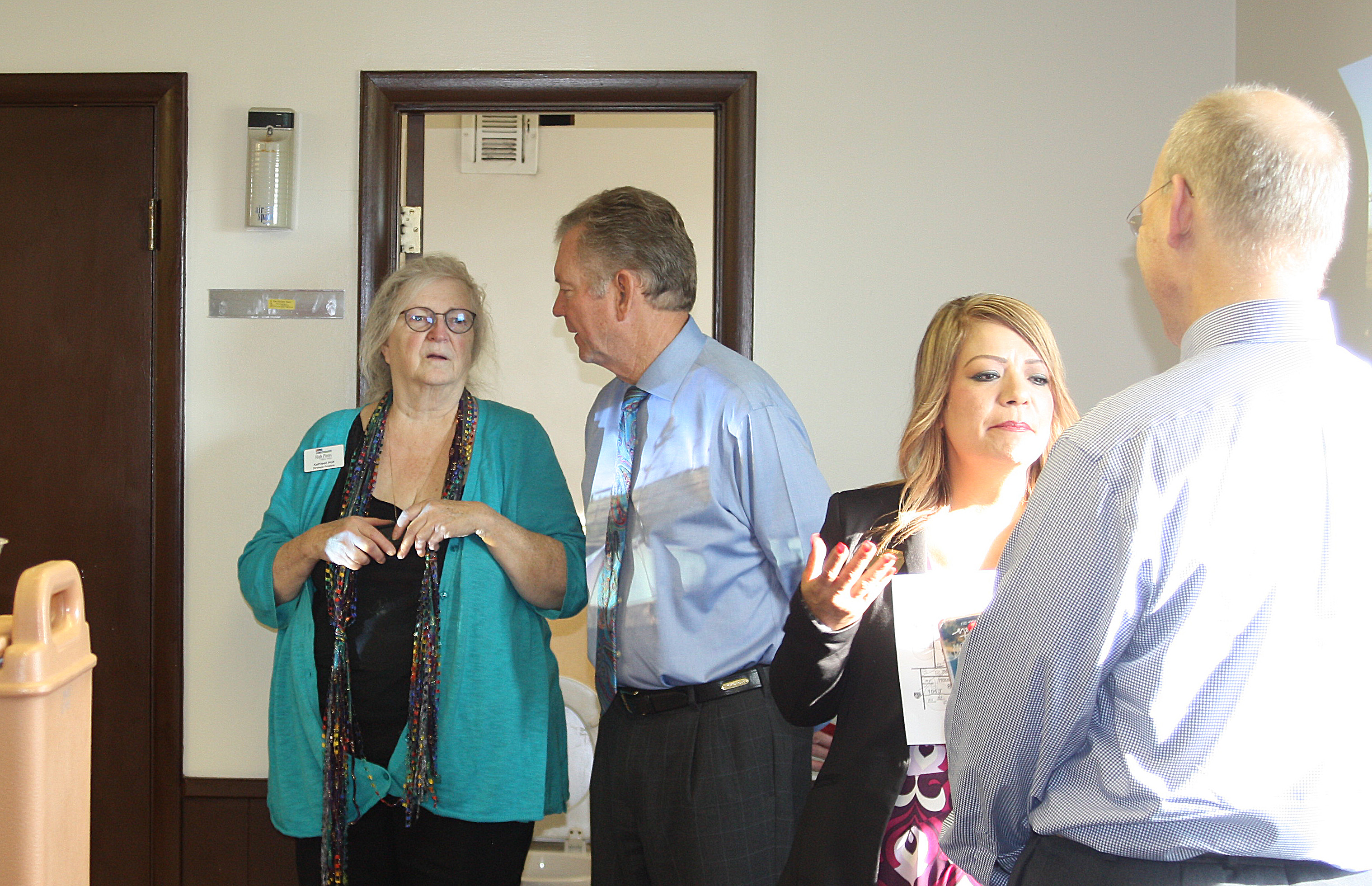 Dr. Harold Nolte, president of Dodge City Community College at KONQ radio station