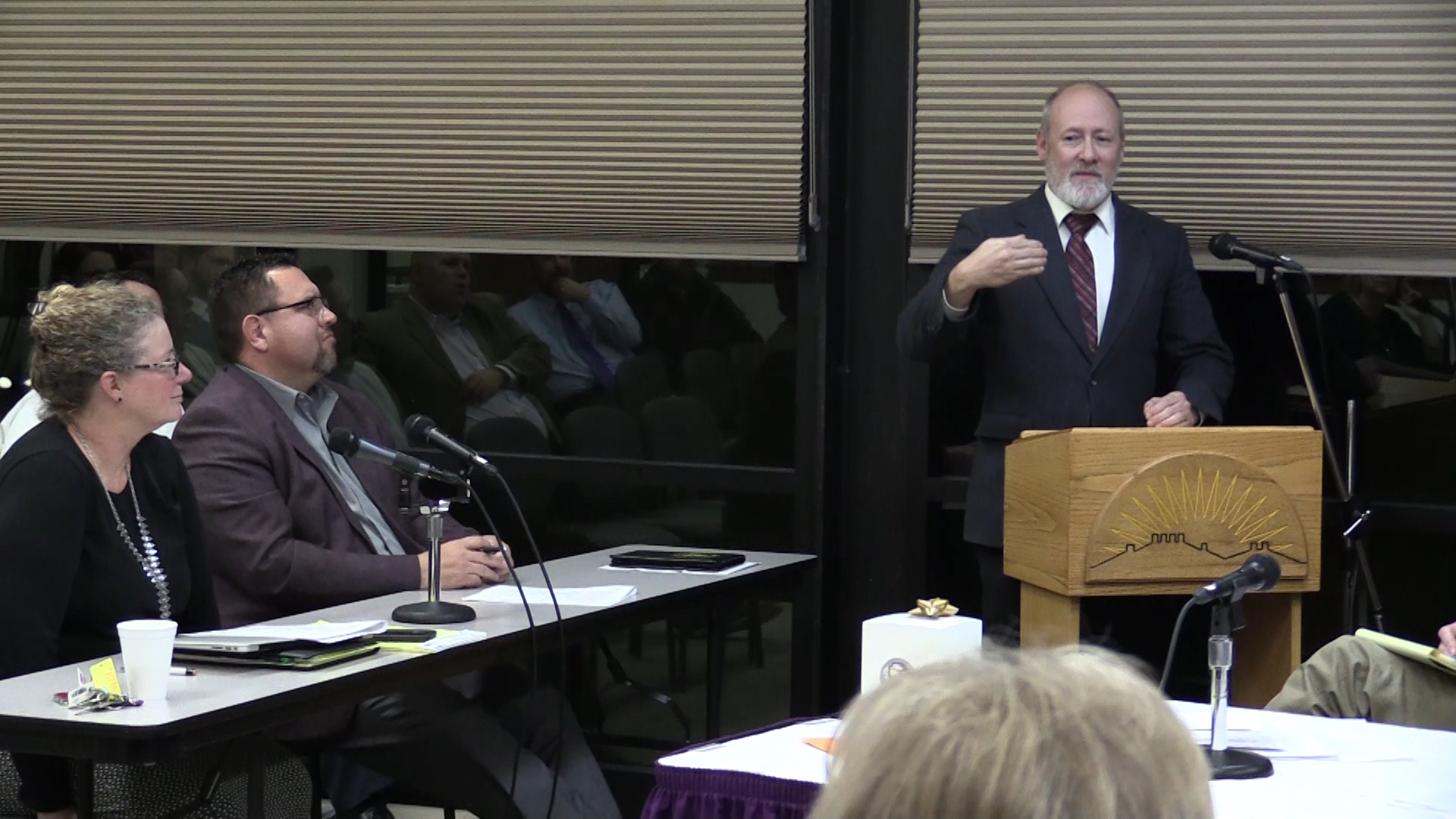 Dr. Scott Searcy talks to the board about the HLC findings