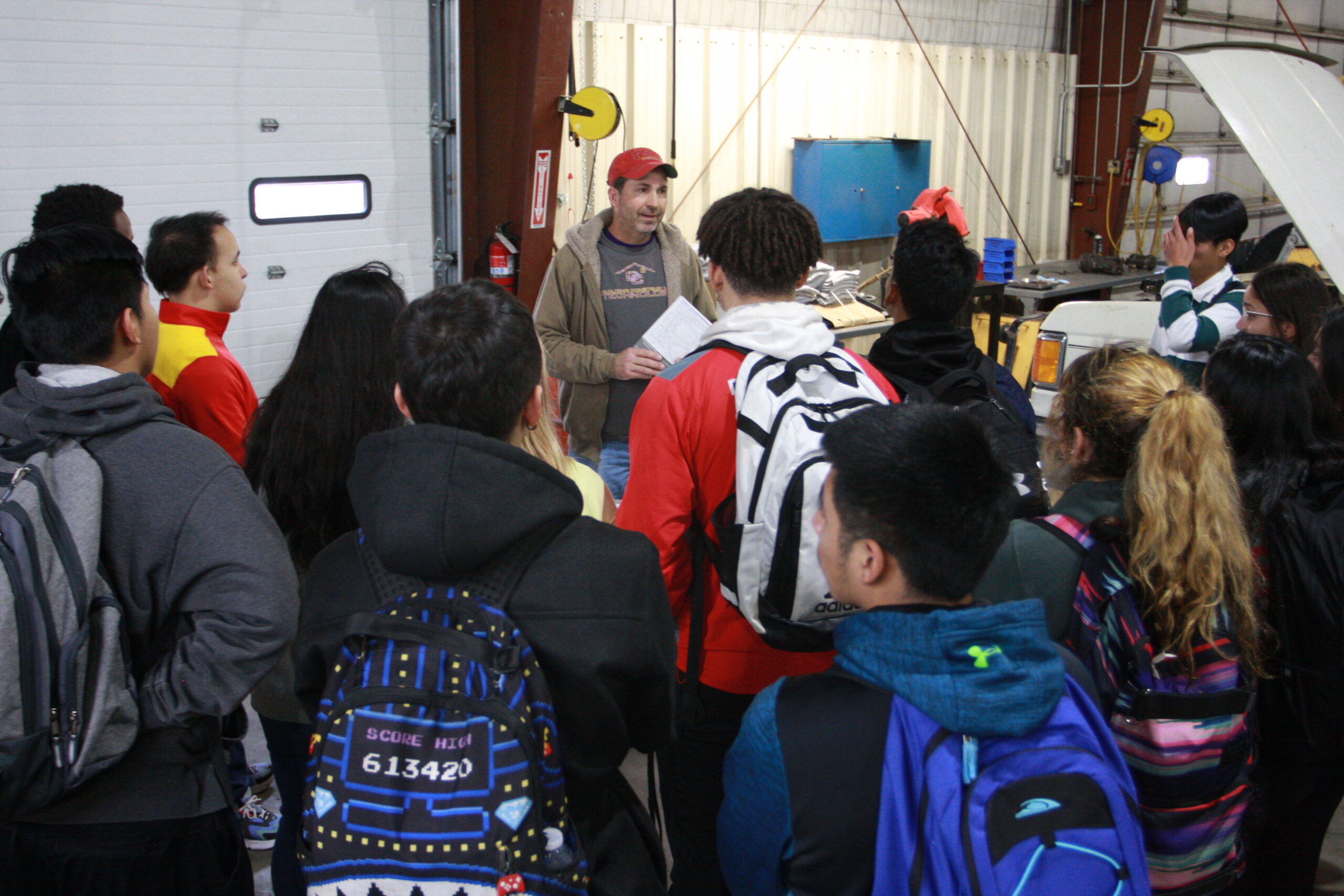 Pat Shiew, professor of Building Construction Technology speaking with students during the 2020 Junior Experience